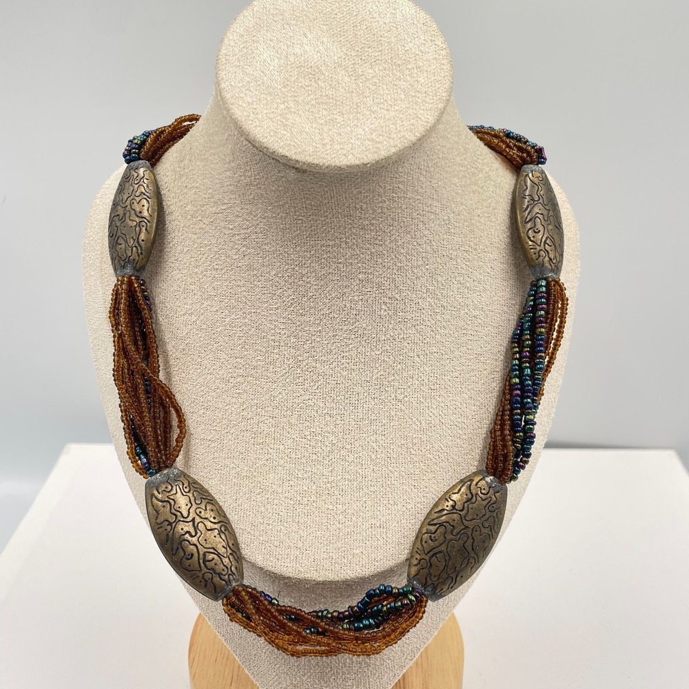 Vintage Boho Multi Strand Seed Bead Necklace Etched Bronze Tone Oval Focal Beads